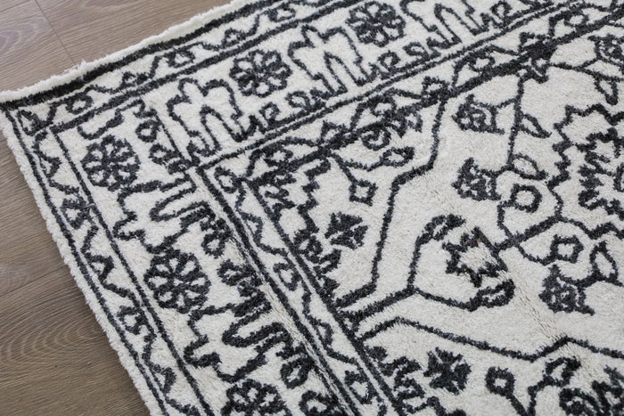 Neel wool rug in living room – 160x230 cm – contemporary blue and ivory pattern – buy online in Australia